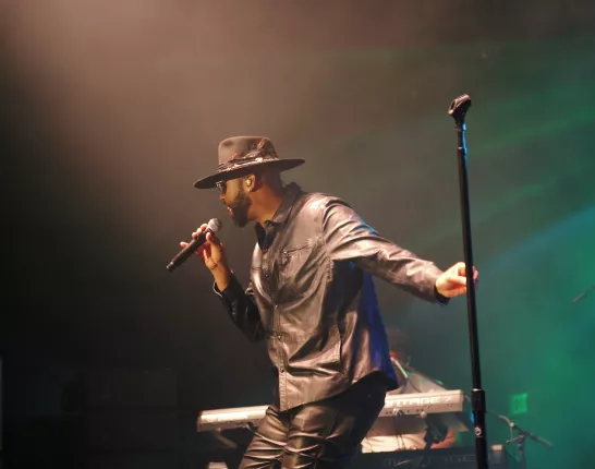 Montell Jordan performing on stage