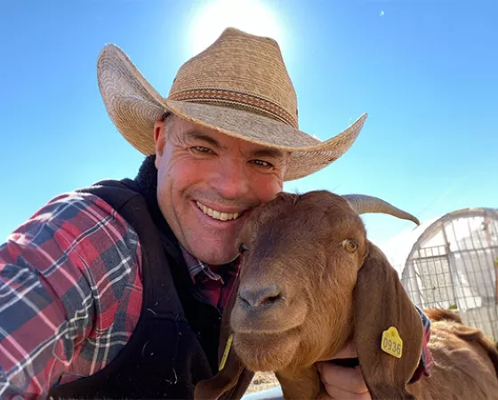 Cowboy Max and a goat