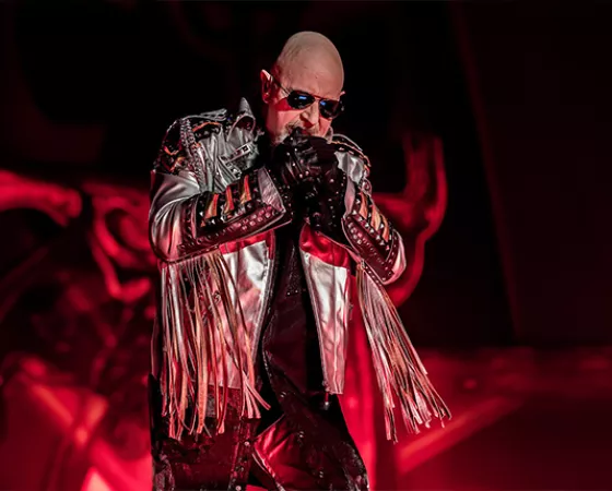 Judas Priest's Rob Halford with a microphone