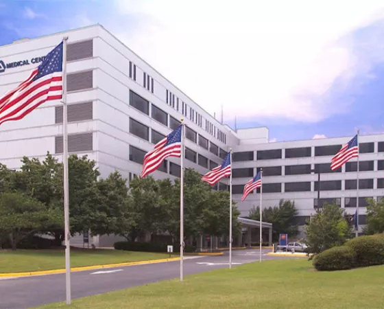 a Veterans Administration Medical Center with American flags 