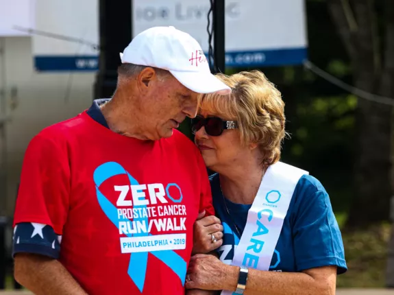 Elderly couple hugging at a 2019 ZERO RunWalk