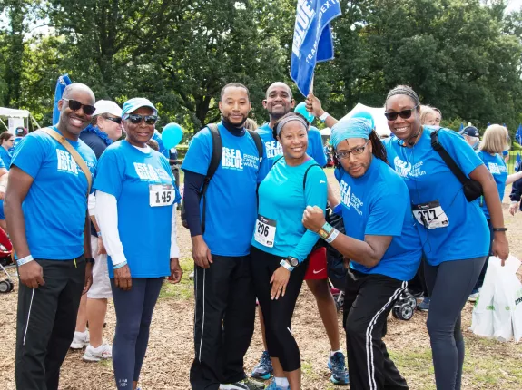 Yvonne and Team Poindexter in matching Blue Shirts
