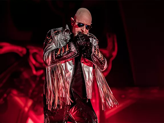Judas Priest's Rob Halford with a microphone