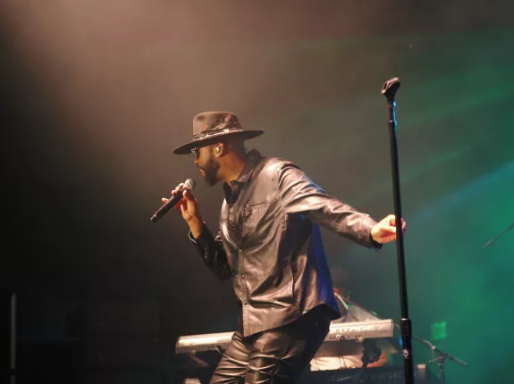 Montell Jordan performing on stage
