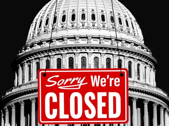 Capital Building with closed sign