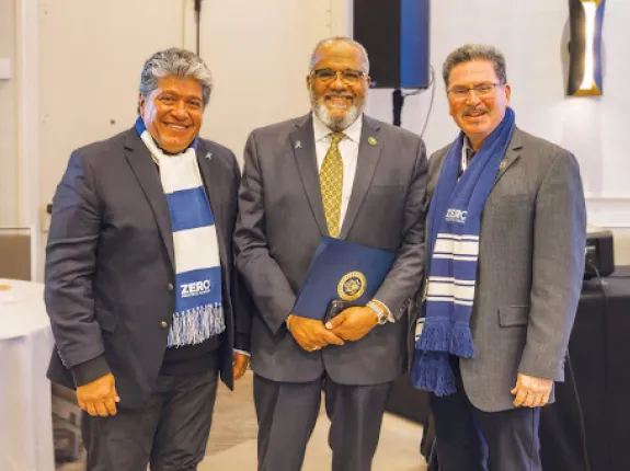 3 men formally dressed, advocates in DC