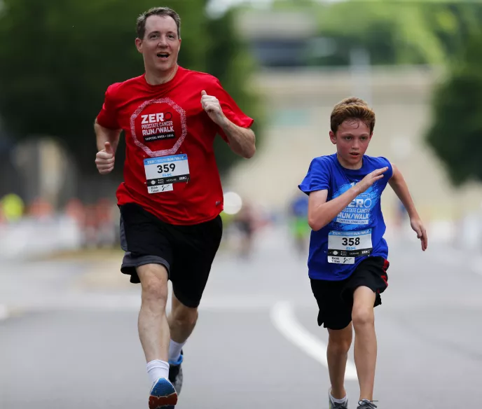 Father and son running at a ZERO DC 2017 RunWalk