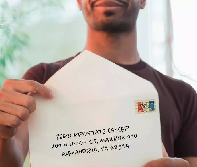 A Man holding an envelope addressed to ZERO 