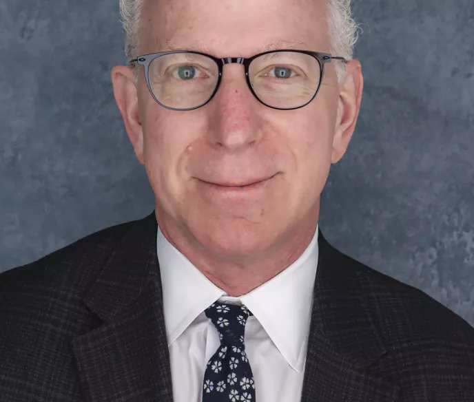 Headshot of Dr. Howard M. Sandler