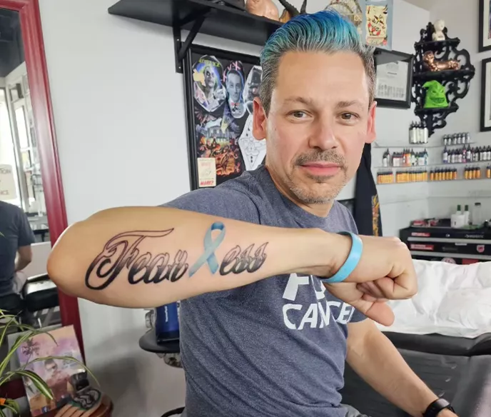 Picture of Leo Nunes showing tattoo on arm