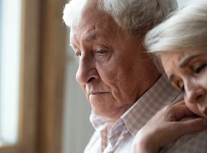 Mature distressed white couple