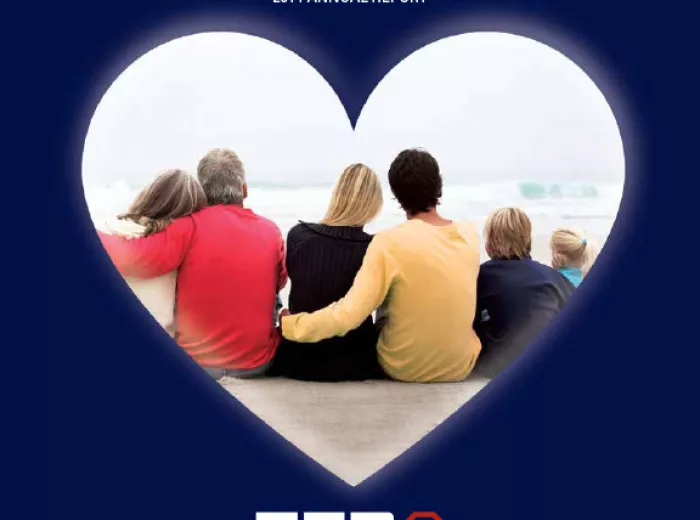A cover of a report showing a group of people looked through a heart-shaped lense