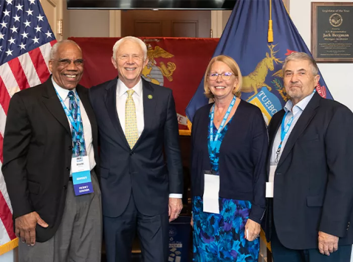 Group of advocates with legislator