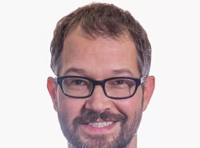 White man with short brown hair and glasses, Jeremy Patch