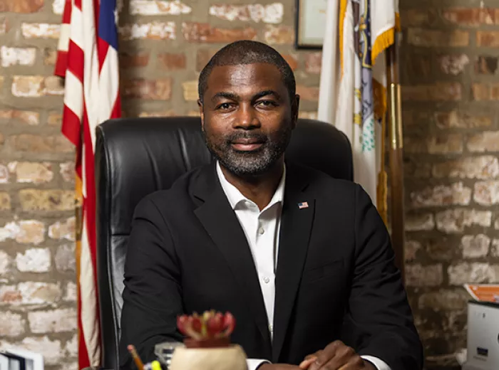 Illinois Rep. La Shawn Ford sitting at his desk