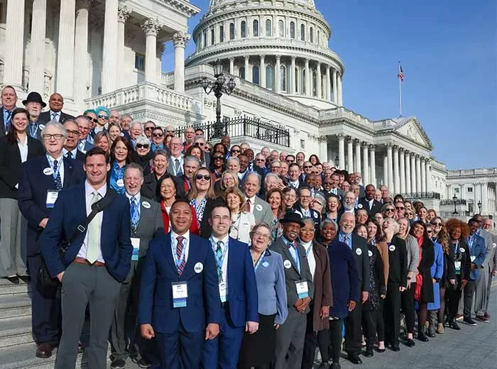 Group of advocates from ZERO Summit 2024 on the steps of Capitol Hill