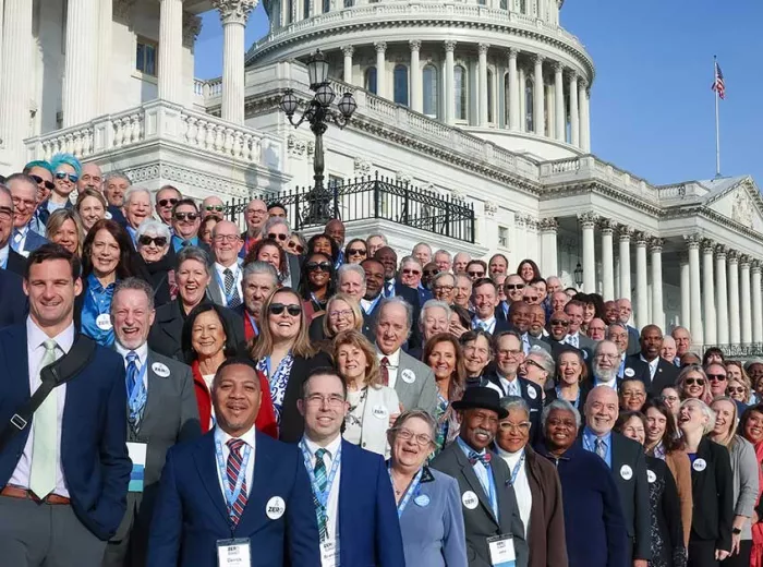 Group of advocates from ZERO Summit 2024 on the steps of Capitol Hill