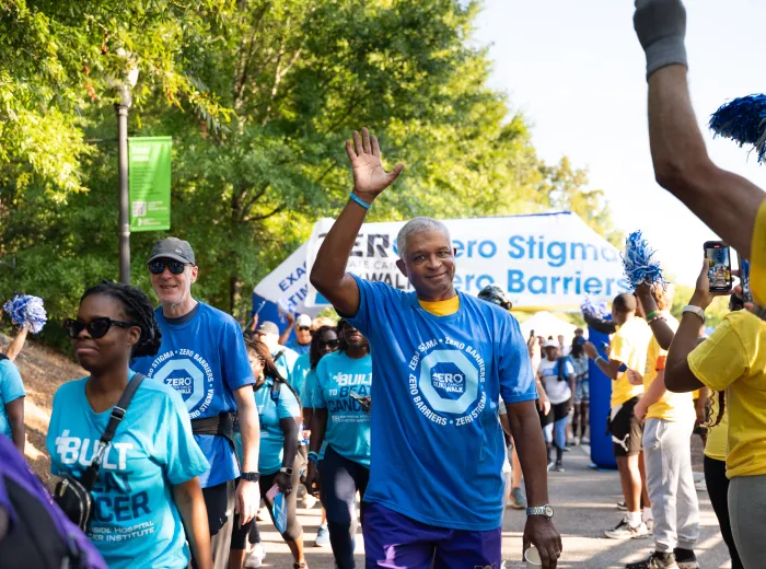 Run/Walk Event with man waving