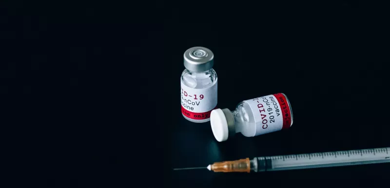 Covid 19 Vaccine on a dark background