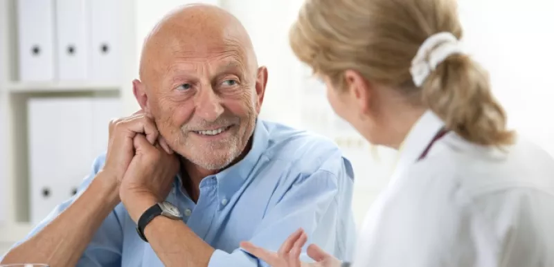Man Talking to His Healthcare Provider about Prostate Cancer Treatment Options