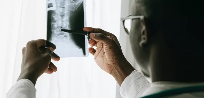 Doctor inspecting a scan