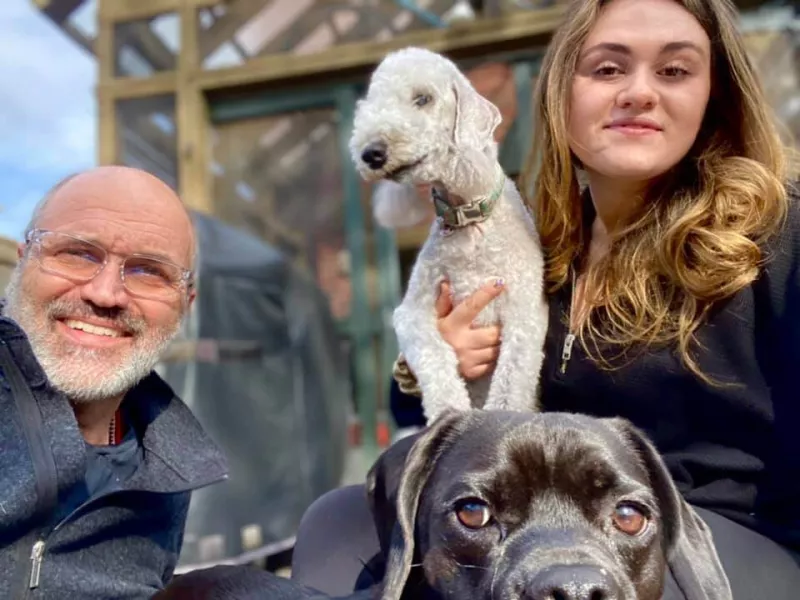 Paul with his daughter and his dogs