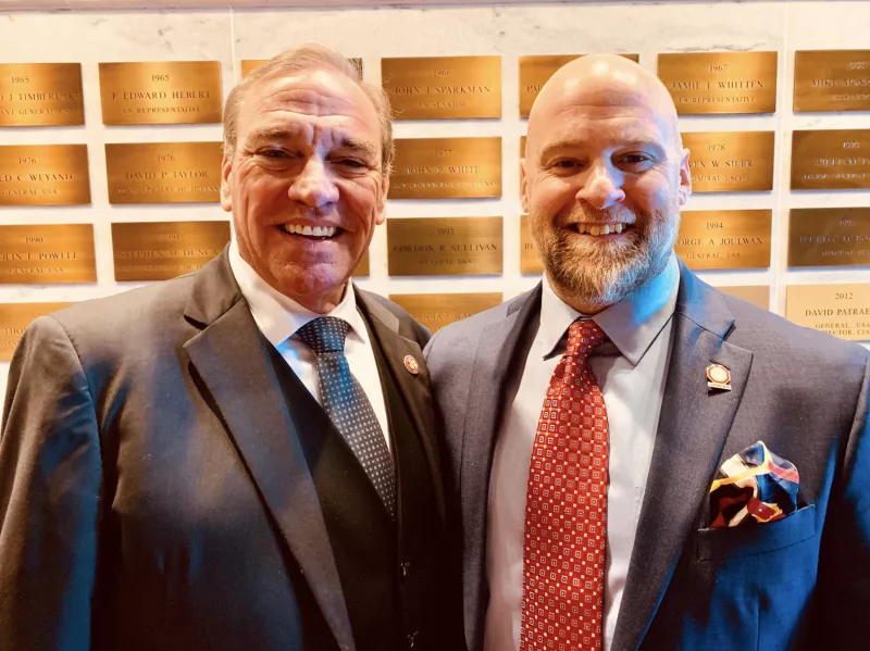 ZERO CEO Jamie Bearse with Congressman Neal Dunn in business suits