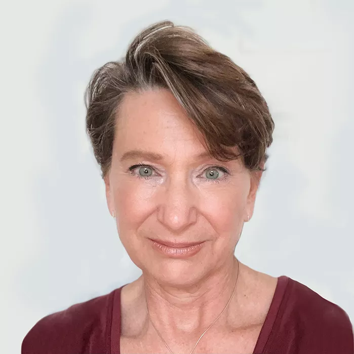 Woman with short brown hair headshot