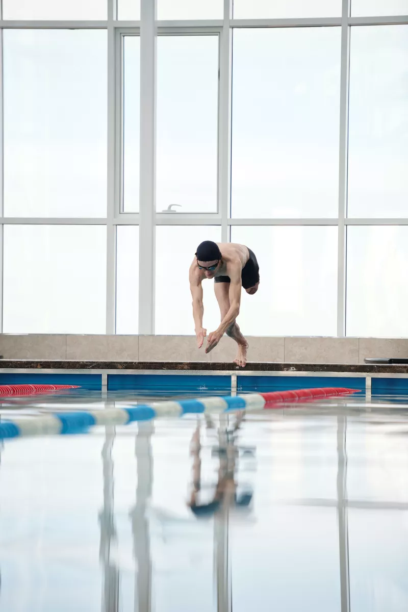 One Legged Man Jumping Into Swimming Pool