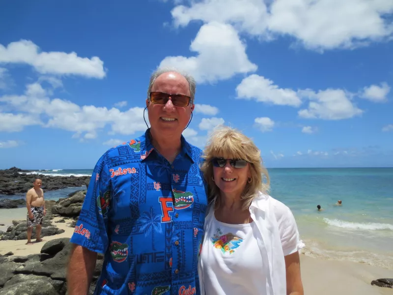 David McElhaney and loved one on a sunny beach
