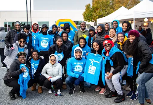 A group poses at a MidAtlantic Run/Walk