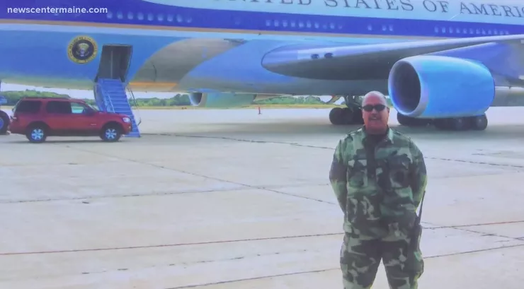 Airman next to an airplane
