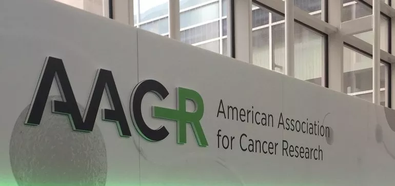 American Association for Cancer Research logo on a wall