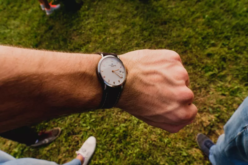 Analog watch on a man's left hand
