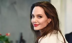 Angelina Jolie smiling at the camera