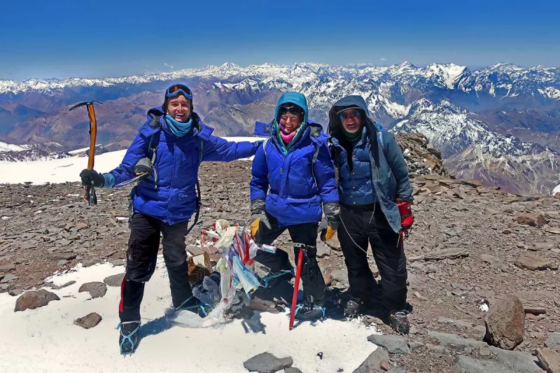 Family of mountain climbers conquering Aconcagua
