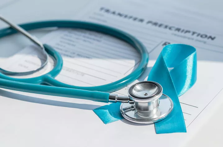 Stethoscope over a blue ribbon