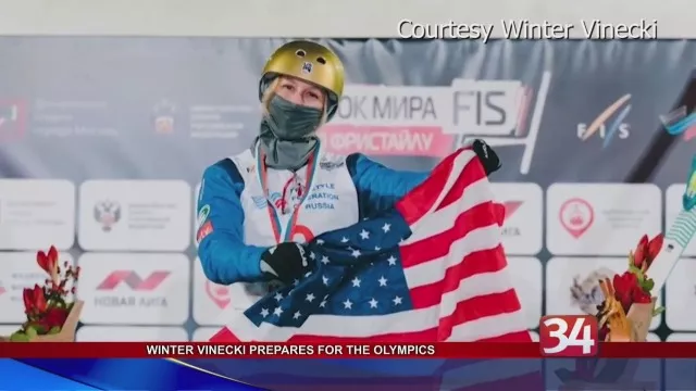 Winter Vinecki holding the American flag