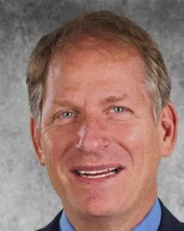 Middle-aged bold man with greying hair