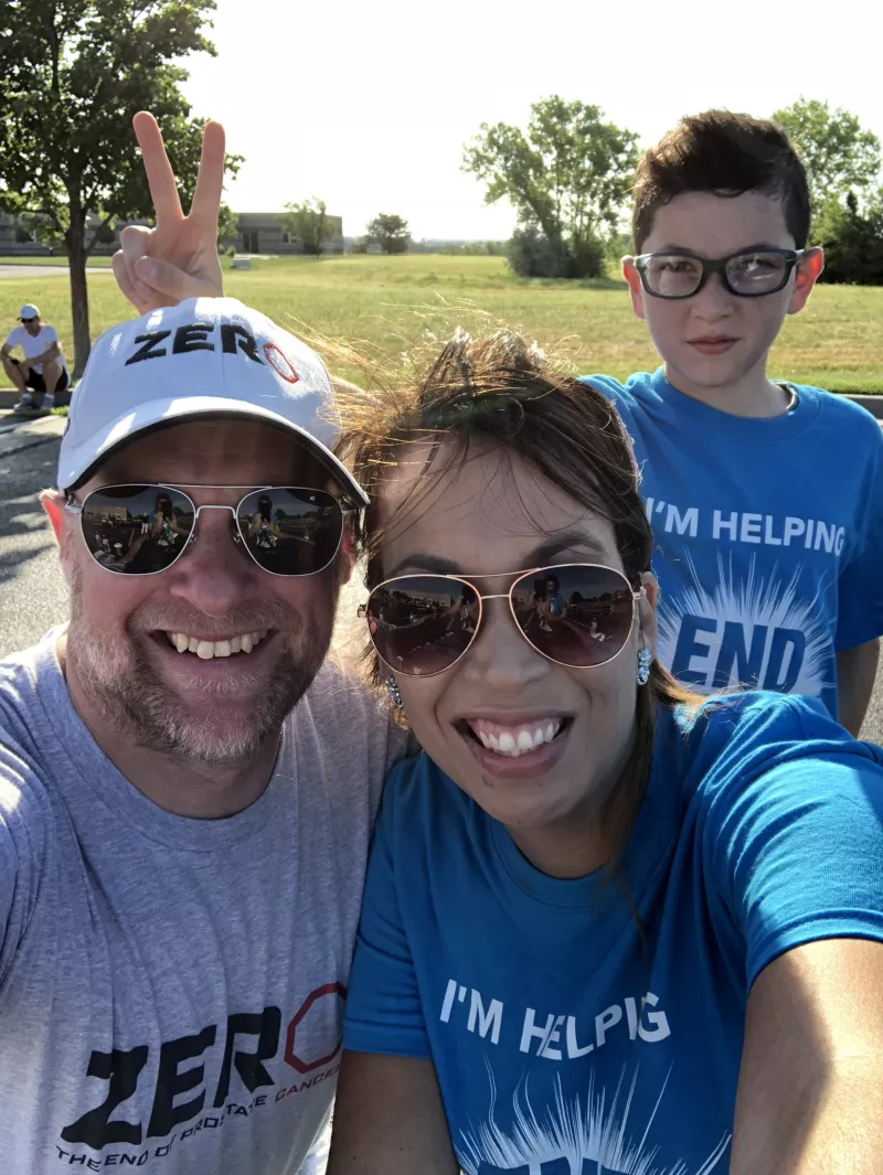 Man, woman and a kid in ZERO sports gear