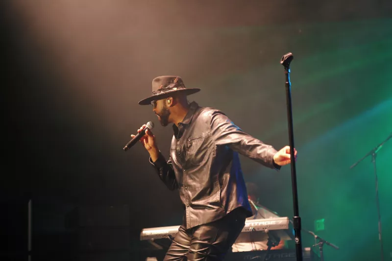 Montell Jordan performing on stage