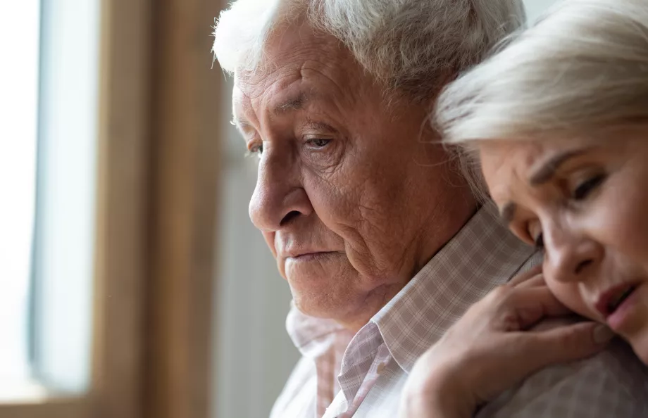 Mature distressed white couple