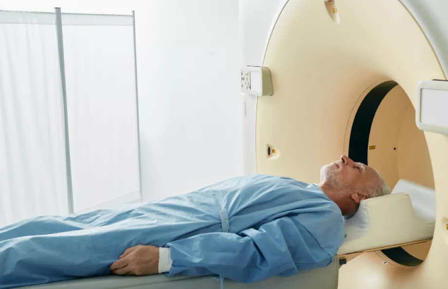 Man laying on table about to receive radiation