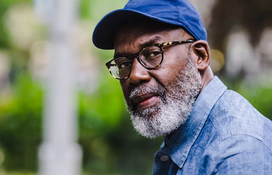 African American man looking into camera