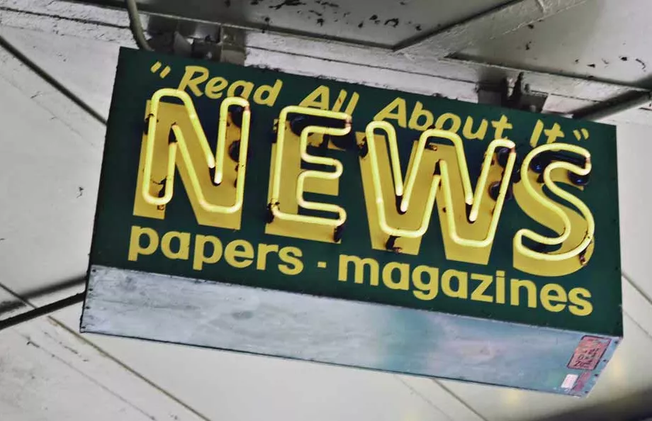 Neon sign that says News