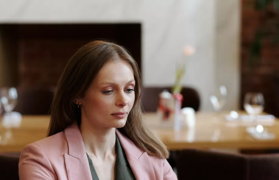 Woman staring at laptop