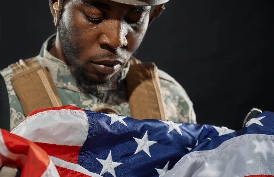 Soldier Holding and American Flag